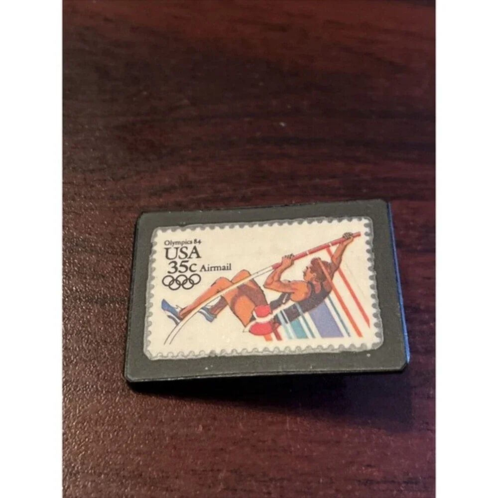 Vintage Olympic Games Team USA Stamp Pole‎ Vault Event Plastic Lapel Hat Pin